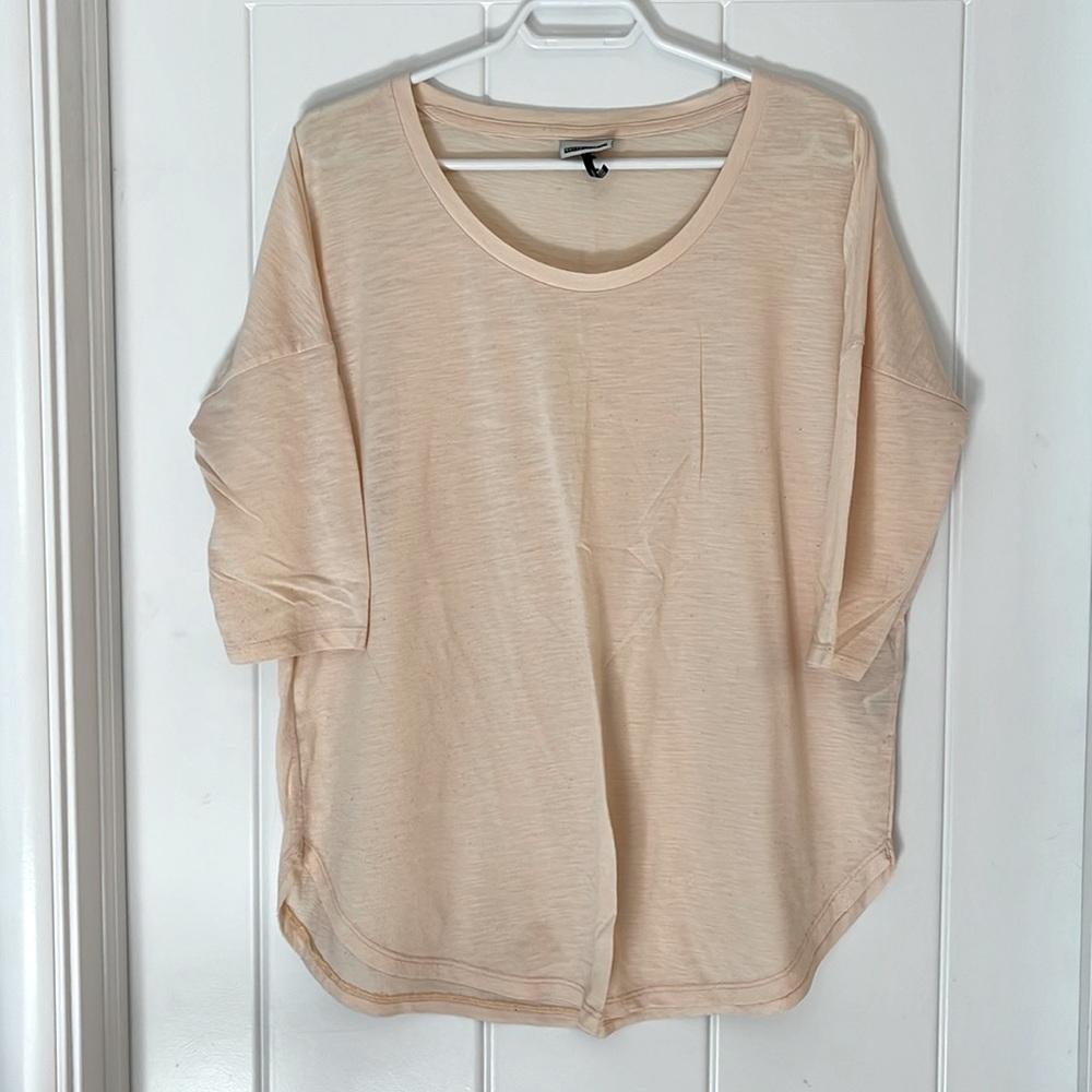 Soft peach coloured flowey t-shirt